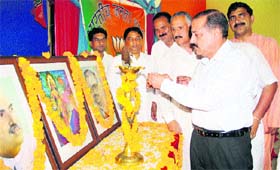 Chief spokesperson for the BJP Jitendra Singh lights a lamp during a one-day Introspection Meeting and Training Workshop in Jammu on Tuesday.