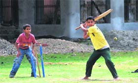 Boys play cricket at Ved Mandir Bal Niketan in Jammu