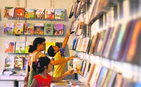 Visitors at a book fair organised by the National Book Trust in Jammu