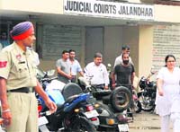 A cop posted at district courts complex. 