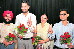 Newly elected members of the student council (from left) secretary Harmeet Singh, president Pushpinder Sharma, vice-president Simarpal Kaur and joint secretary Gaurav Kumar all smiles at Panjab University on Wednesday