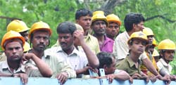 Workers of the Delhi Metro at the site of the blast in New Delhi on Wednesday.