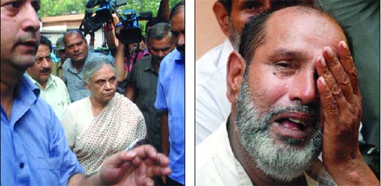 A man mourns the death of his relative at Ram Manohar Lohia Hospital in New Delhi on Wednesday.