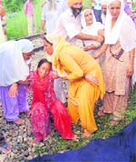 Kin of a victim in an inconsolable condition after the collision near Khojewal in Jalandhar