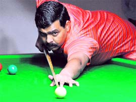 A snooker player in action in Chandigarh on Thursday.