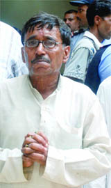A relative of a victim at RML Hospital.