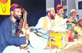Kashmiri musicians give a performance at MKP Girls College in Dehradun on Thursday.