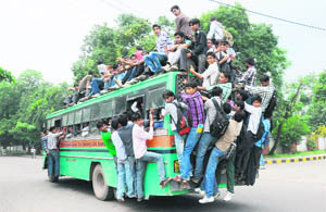 Most buses were overcrowded like this one after Haryana Roadways vehicles went off the road owing to a dispute with private bus transporters in Karnal