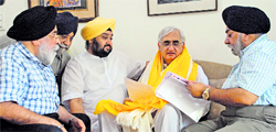 DSGMC chief PS Sarna with Union Law Minister Salman Khursheed in Delhi