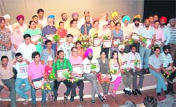 Members of Manch Rangmanch at a function to celebrate 20th anniversary of the group. 