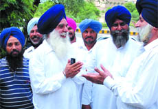 SAD candidate Gurpal Singh Gora along with his supporters seeks votes while campaigning in Gidderbaha on Friday. 