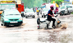 A waterlogged road stretch at Zirakpur on Friday