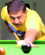 Neeraj Sarna aims a shot during the first Chandigarh Club Amateur Snooker Tournament in Chandigarh Club