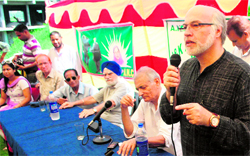Muzaffar Shah, senior vice-president of the Awami National Conference, speaks during an Eid Milan function in Jammu on Friday