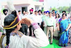 CBSE chairperson Vineet Joshi receives a welcome salute during his visit at Sri Guru Harkrishan Public School in Amritsar on Saturday. 