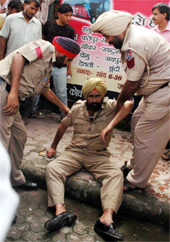 A drunk cop creates a scene outside the SSP office in Bathinda on Saturday