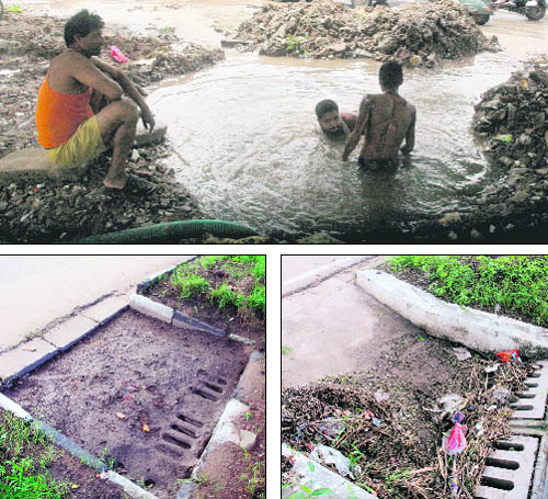 Chandigarh Municipal Corporation workers try to fix a leak in a pipe that burst on the road separating Sectors 33 and 34 in Chandigarh ; and (below) The MC seems to have forgotten to make ‘post-rain arrangements’ of cleaning road gullies as shown by trenches blocked with mud near Sectors 18/22 roundabout and at the light point of Sectors 15/16 in Chandigarh on Saturday