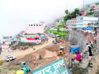 A view of the bus stand that is under construction at Pauri town.