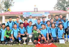 The team of the Tibetan Nehru Memorial School that won the RIMC Soccer Cup in Dehradun. 