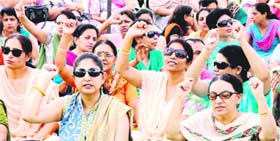A file photo of college teachers protest