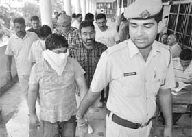 The accused being produced in a court in Panchkula on Sunday
