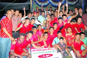 The Adhoiwala Boys team with the Lala Nemi Dass Memorial District Football League trophy in Dehradun on Sunday