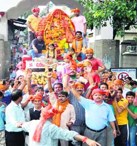 FESTIVE FERVOUR: Devotees carry Lord Ganeshas idol for immersion on the last day of Ganesh Utsav in Kangra on Sunday