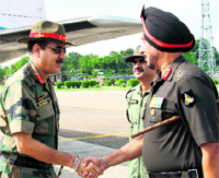Lt-Gen AK Singh, Army Commander, Southern Command (left), being received by Maj-Gen TPS Waraich, GOC of the Tiger Division in Jammu on Sunday
