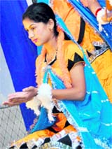 Girls perform a dance during the Onam celebration by Udaya Kerala Arts and Sports Club in Ludhiana on Sunday.