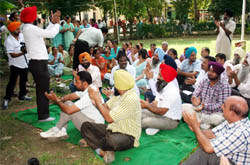 The employees of the Health Department during their indefinite strike in Faridkot on Monday. 