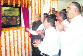 Chief Minister Prem Kumar Dhumal dedicates a tourism information centre to the public in Solan on Monday
