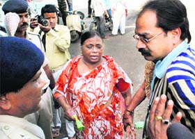 Uma Gupta, mother of ex-Indian IAF officer Anjali Gupta, outside the mortuary at Hamidia Hospital in Bhopal