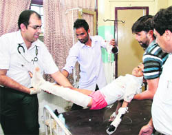 An injured child being shifted to a ward 