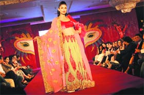 Models display the creations by international designer Emannuelle Junqueira in Ludhiana 