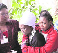 Grieving relatives of victims at Kenyatta National Hospital in Nairobi on Monday.