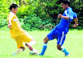 A match between GPG College, New Tehri (in yellow), and MPG College, Mussoorie (in blue), in the Hemwati Nandan Bahuguna Garhwal University Inter-Collegiate Football Tournament in progress in Dehradun on Tuesday. 