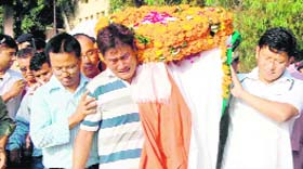 Deputy Jailer, Roorkee prison, Narendra Singh Thapas body is taken to the Khadkhadi cremation ghat in Haridwar on Tuesday.