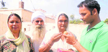 Residents of Jagdishpura village in Kaithal district celebrate the release of Taranjit, a village resident, on death row in Sharjah. Taranjit was one of the 17 Indians on death row in connection with the murder of a Pakistani in a bootlegging case in Sharjah. 