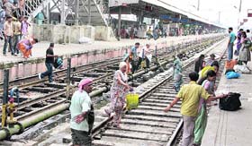 COURTING DANGER: A number of passengers, including children and the elderly, crossing the railway track at Jalandhar City railway station