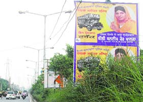 One of the many unauthorised hoardings that dot the city landscape