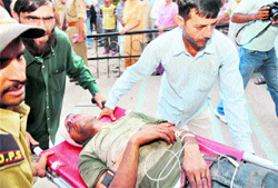 An injured passenger being taken to the GMCH in Jammu on Tuesday