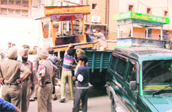 An MC team removes illegal rehris in the Bhadaur House area