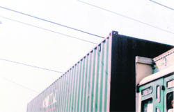 A container truck passes at a sniffing distance from the 66 KV high-tension cables at Bhai Himmat Singh Nagar in Ludhiana