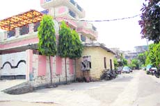 The accommodation illegally raised for security guards, while encroaching on the public passage, by a politician adjoining his house, in Amritsar. 