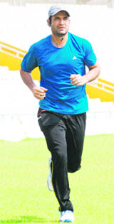 Cricketer Irfan Pathan at a practice session in PCA Stadium, Mohali, on Wednesday.