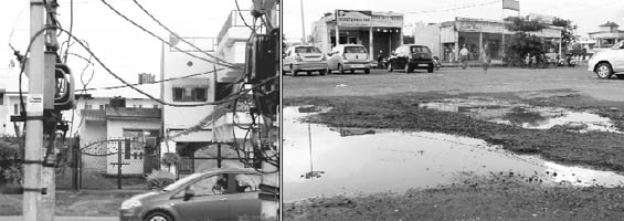 A transformer installed at a low level; and (right) a damaged road at the market and at Sector 10 in Panchkula. 