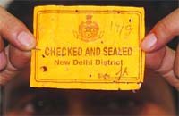 A Delhi police sticker which is pasted on the windshield of vehicles entering the premises of the Delhi High Court after being thoroughly checked