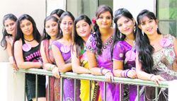 Girl students of MTSM College pose during the fresher’s party in Ludhiana on Wednesday