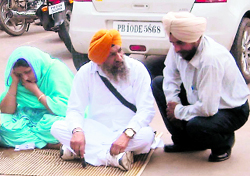 SGPC executive member Karnail Singh Panjoli at a dharna outside Fatehgarh Sahib SSP office