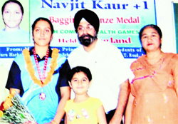 Navjit Kaur, a bronze winner at the Youth Commonwealth Games in England, at Sri Guru Harkrishan Public School in Amritsar